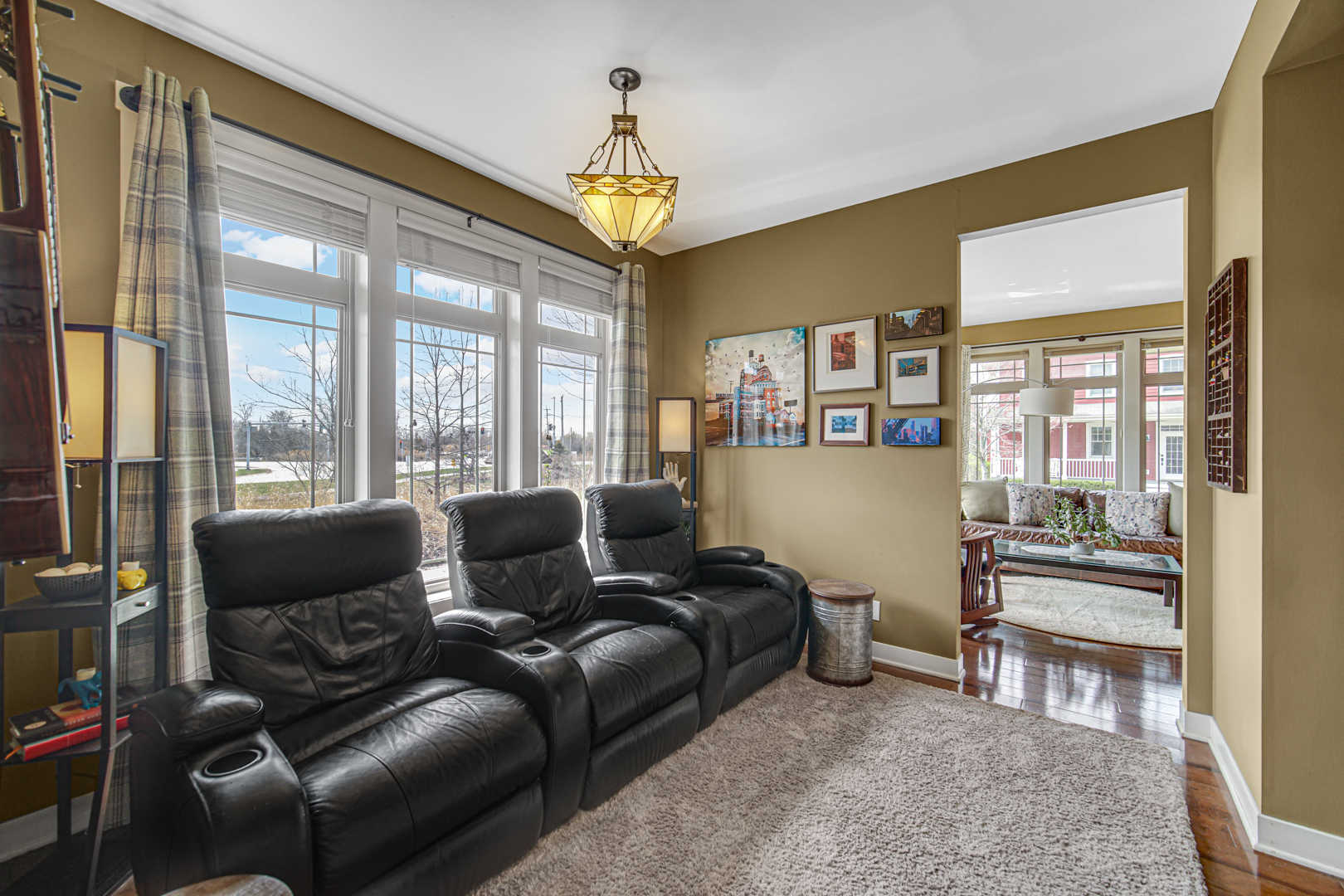 1024 Harris Road Grayslake, IL 60030 - Photo 10 of 68 a living room with furniture and a chandelier