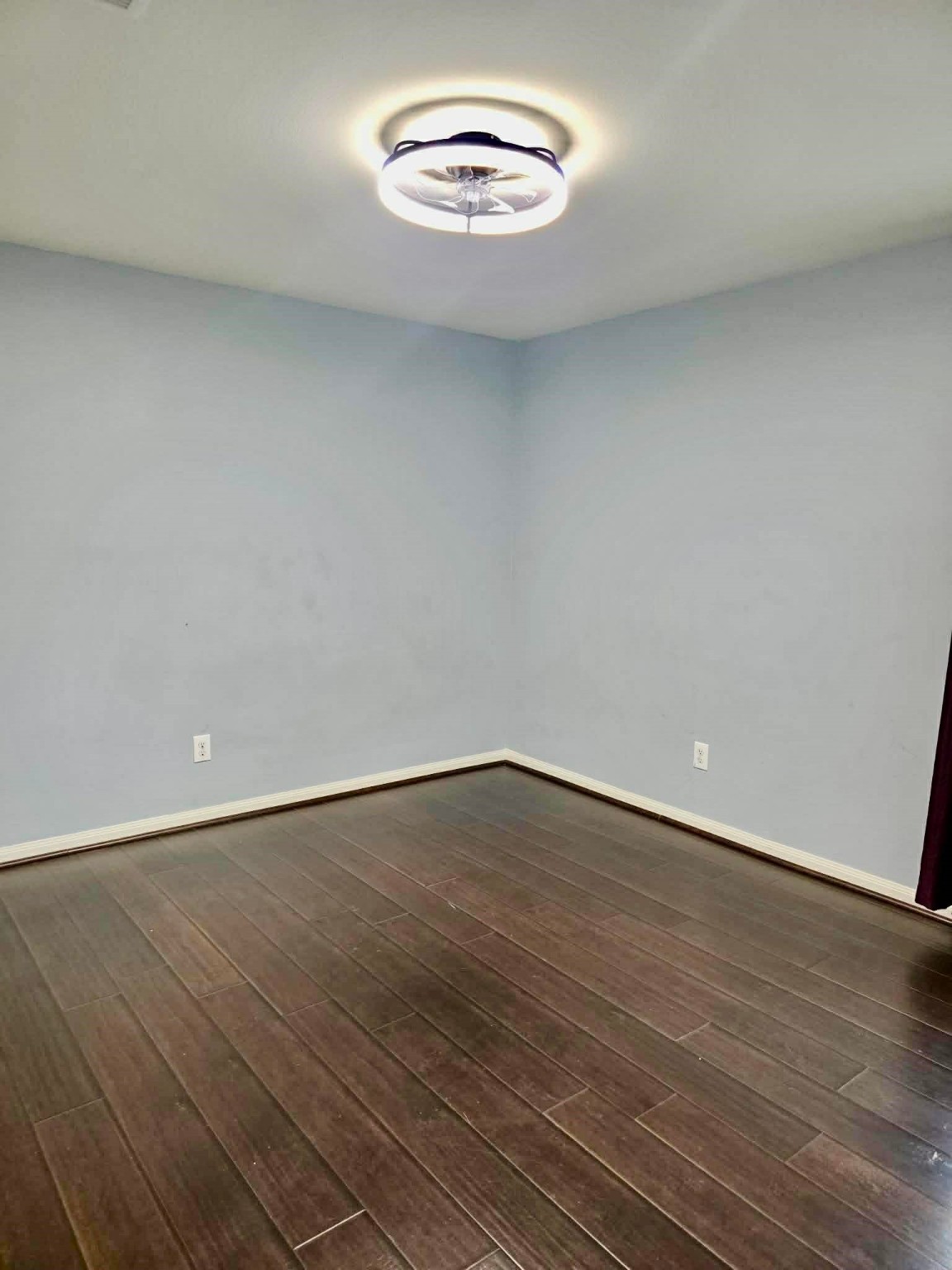 11207 Hall Ridge Court Houston, TX 77075 - Photo 13 of 16 a view of an empty room with wooden floor and a window