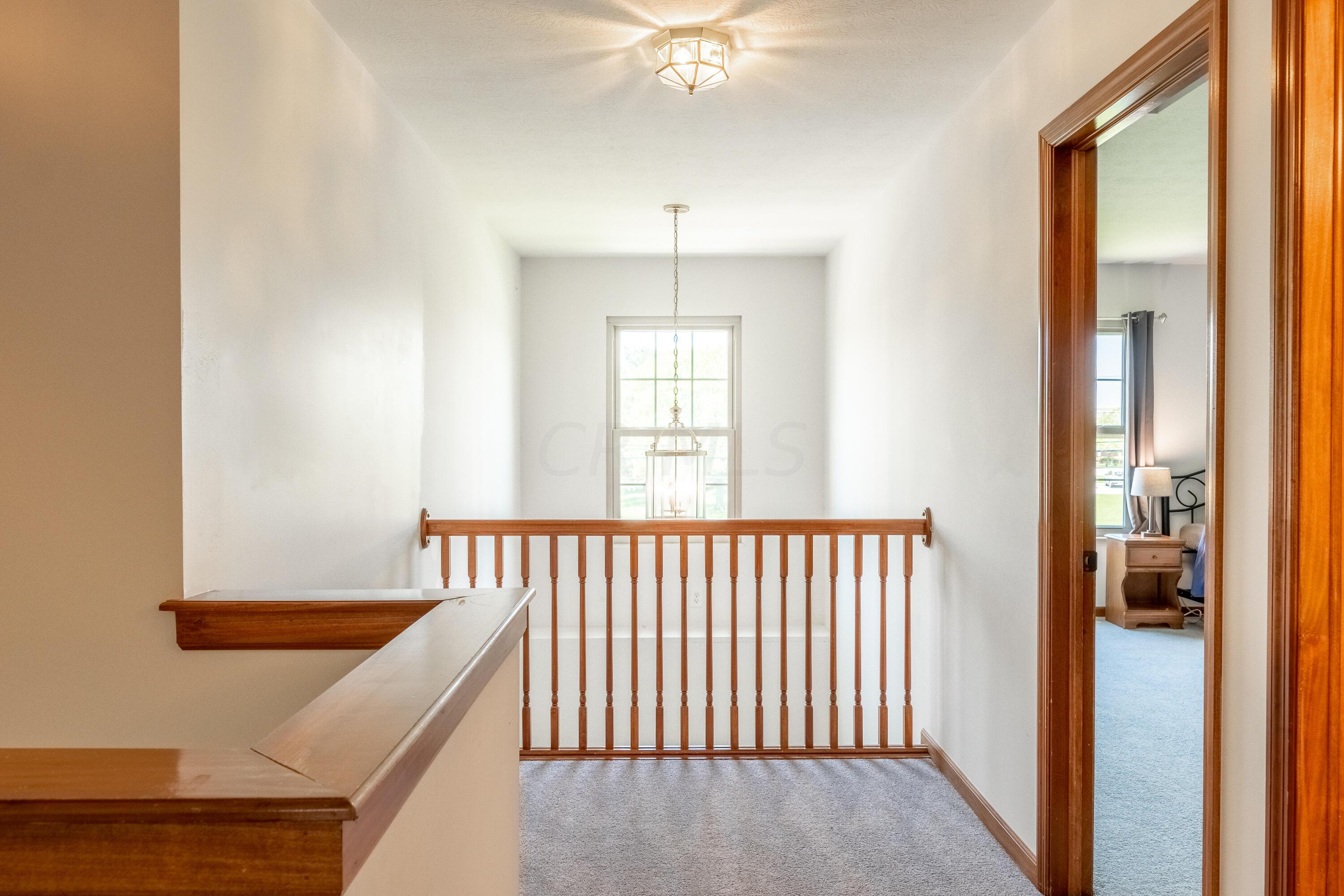7168 Linworth Road Columbus, OH 43235 - Photo 20 of 34 2nd floor loft overlooking foyer