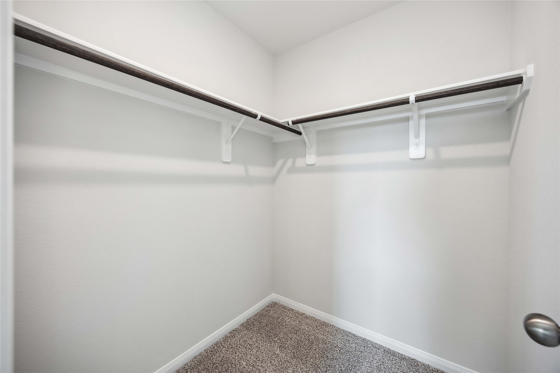 9519 Sweet Tea Lane Needville, TX 77461 - Photo 23 of 35 a view of an empty walk in closet