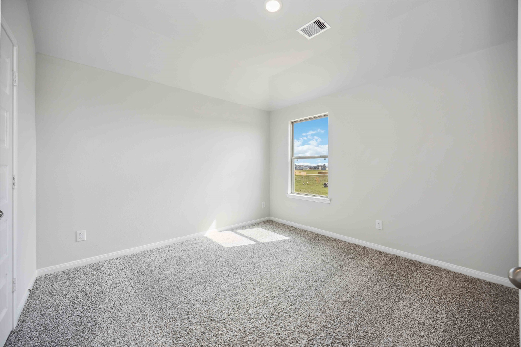 9519 Sweet Tea Lane Needville, TX 77461 - Photo 24 of 35 a view of an empty room with a window
