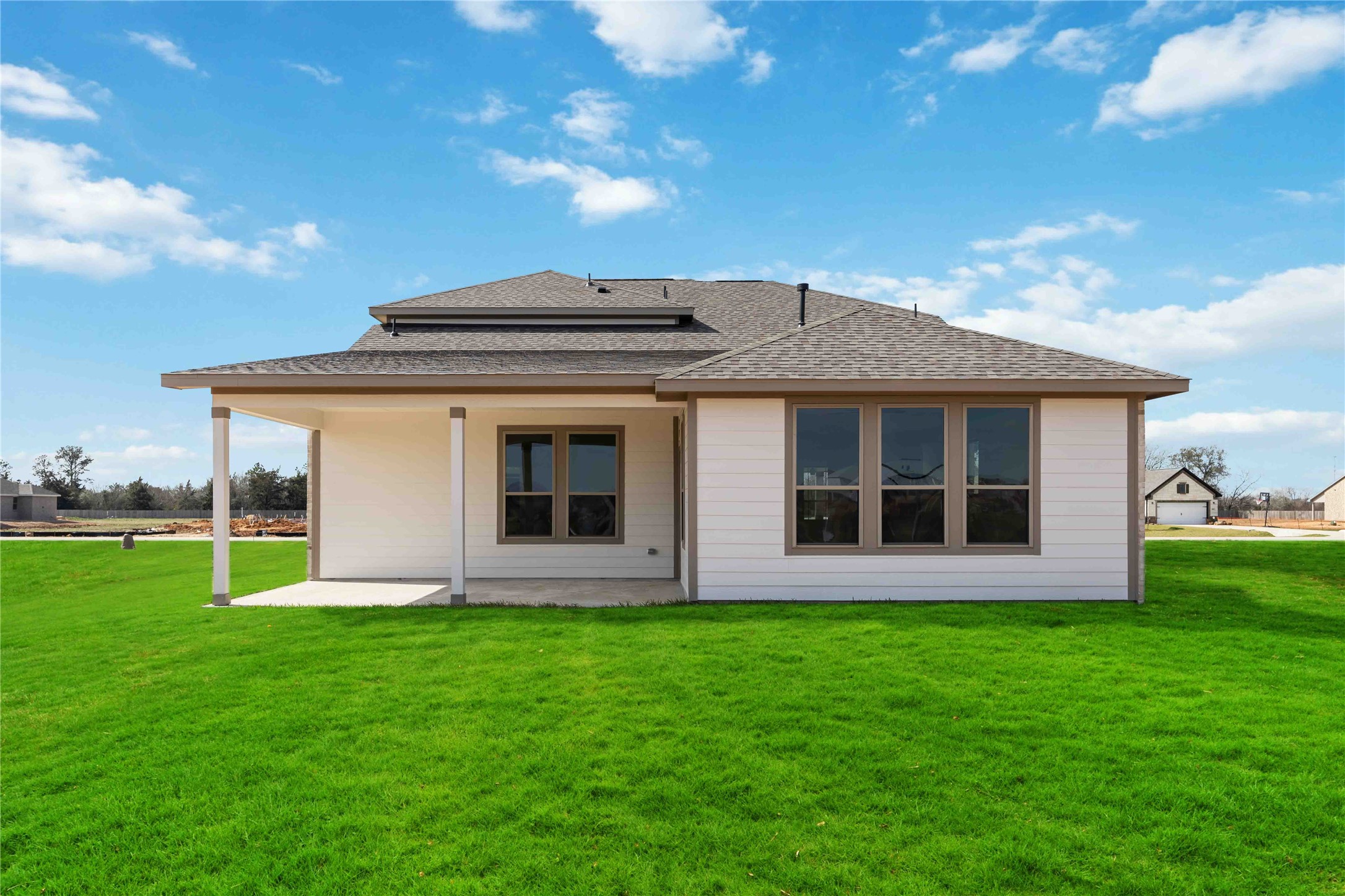 9519 Sweet Tea Lane Needville, TX 77461 - Photo 27 of 35 a front view of house with a garden