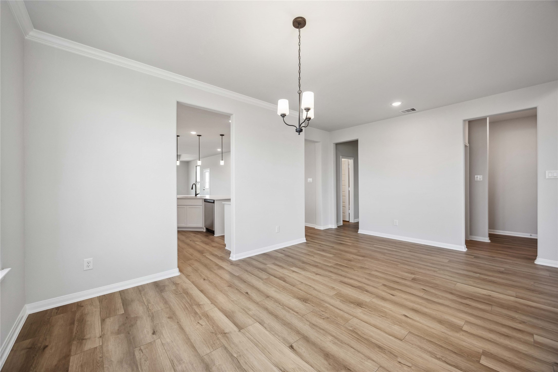 9519 Sweet Tea Lane Needville, TX 77461 - Photo 10 of 35 a view of a livingroom with a chandelier