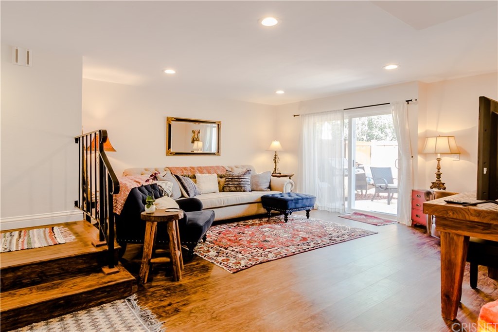 27462 Country Glen Road Agoura Hills, CA 91301 - Photo 2 of 19 a living room with furniture rug and a table