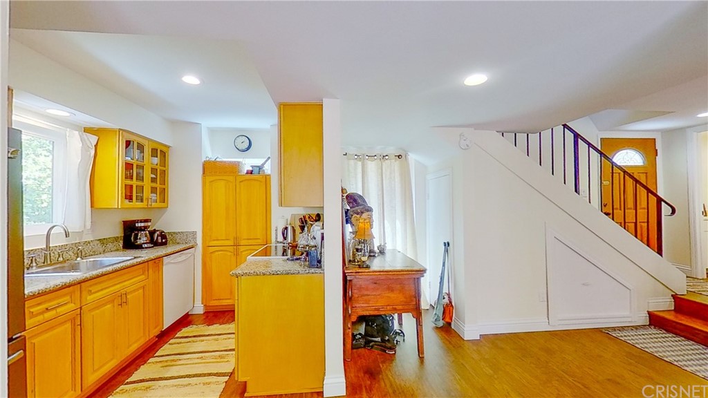 27462 Country Glen Road Agoura Hills, CA 91301 - Photo 9 of 19 a view of a kitchen with furniture and a kitchen