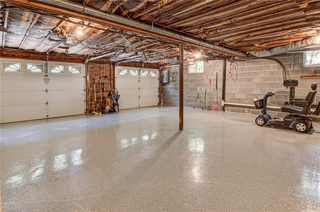 618 Hertford Road Winston-Salem, NC 27104 - Photo 36 of 42 basement garage with epoxy finish flooring