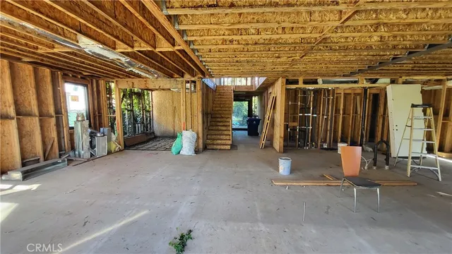 a view of a porch with wooden floor and outer view