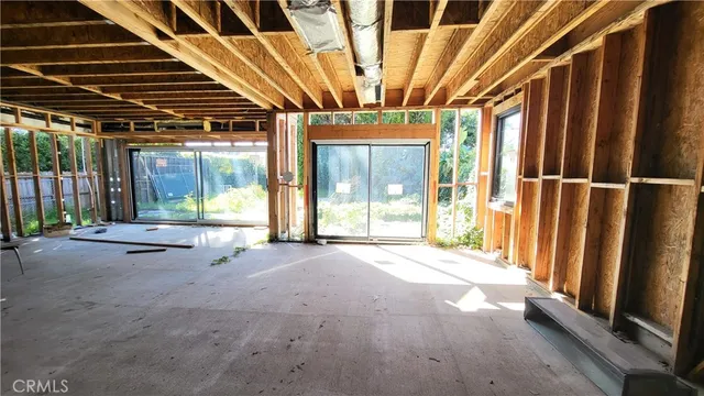 a view of balcony and wooden floor