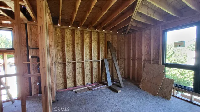 a view of an empty room with a sliding door