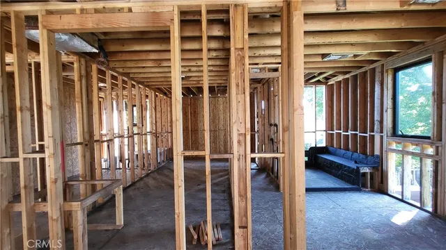 a view of front door with wooden floor