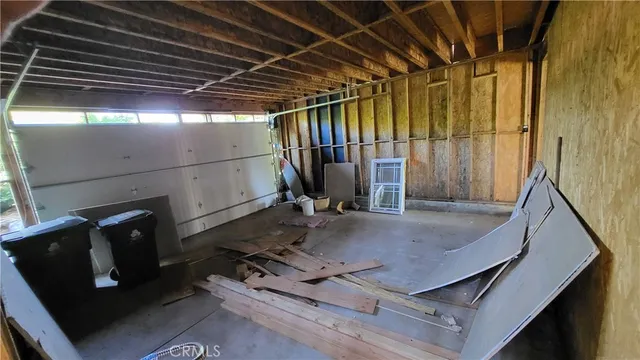 a view of an empty room with stairs