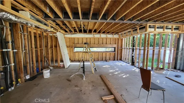 a view of a room with wooden walls