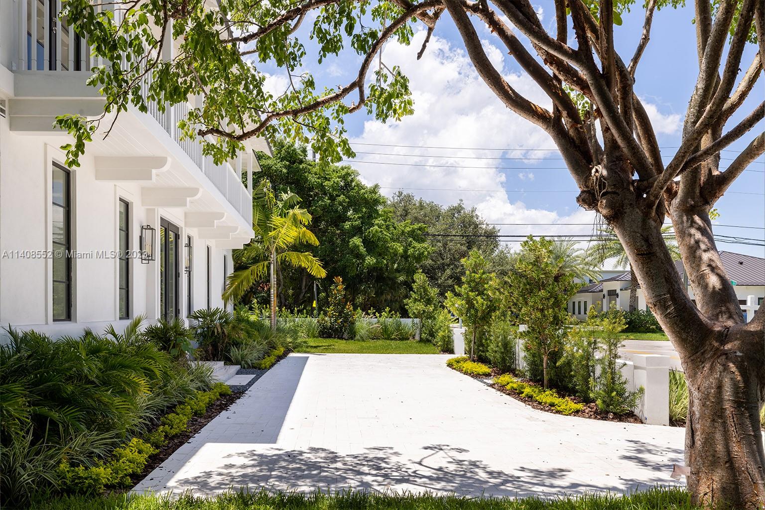 5500 Southwest 74th Street Miami, FL 33143 - Photo 5 of 31 a view of a yard with plants and trees