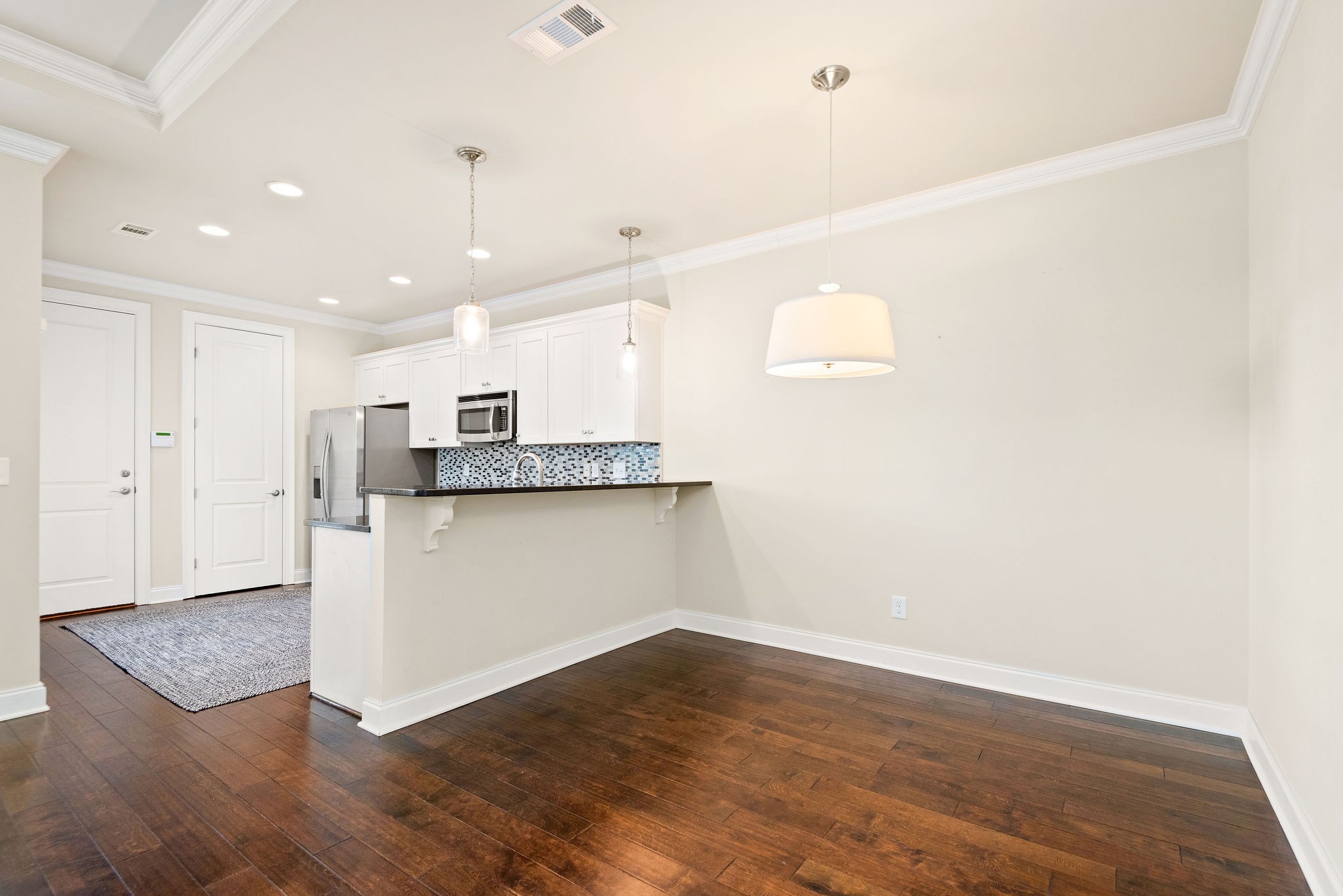 1031 Howland Street Franklin, TN 37064 - Photo 16 of 69 a view of kitchen with granite countertop cabinets and refrigerator
