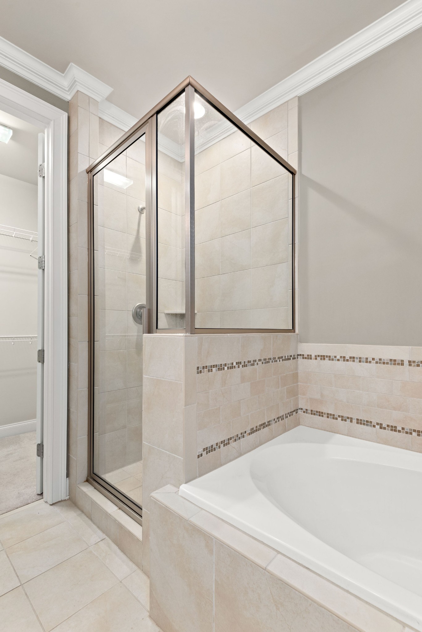 1031 Howland Street Franklin, TN 37064 - Photo 26 of 69 a bathroom with a bathtub and a shower