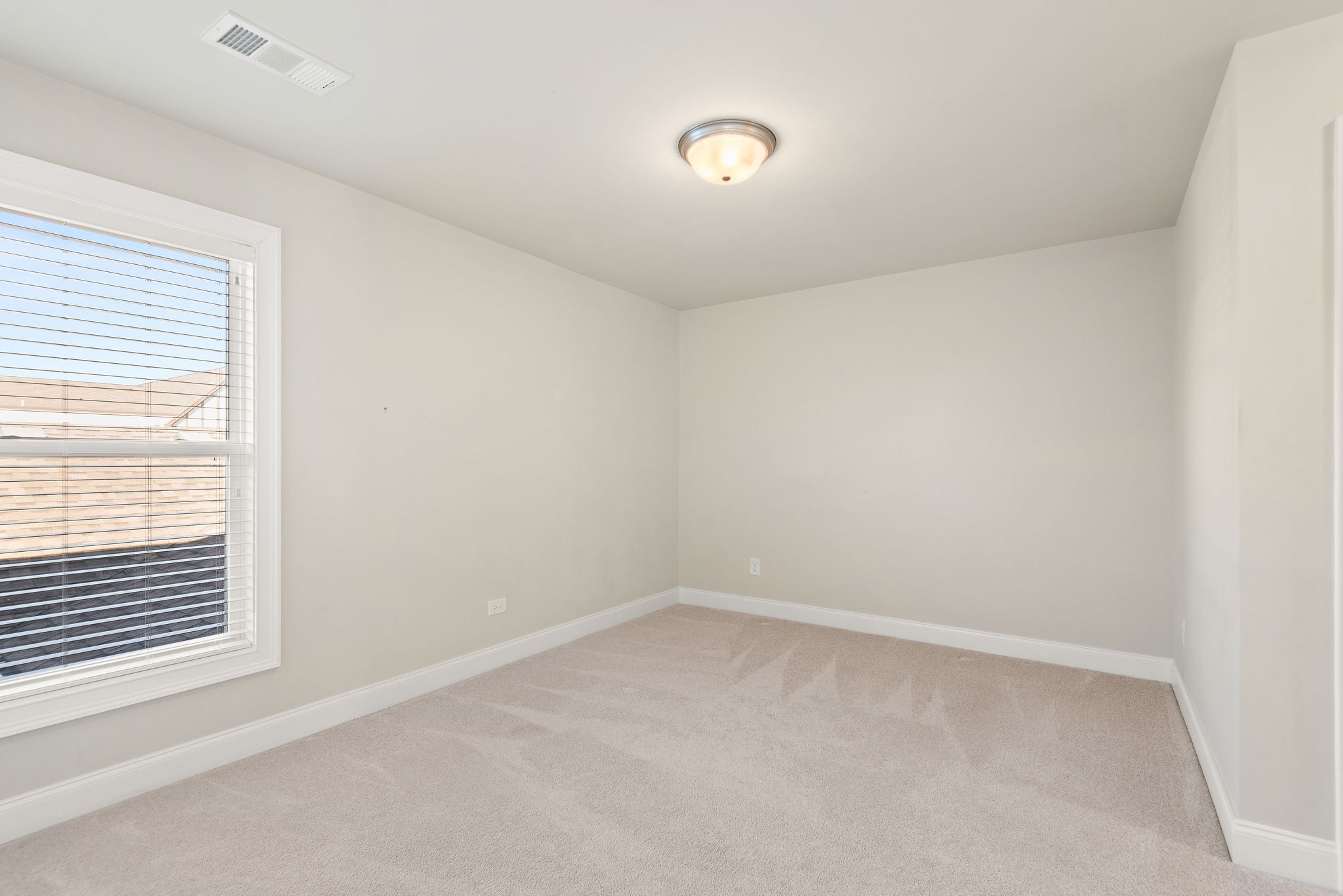 1031 Howland Street Franklin, TN 37064 - Photo 33 of 69 a view of an empty room with a window