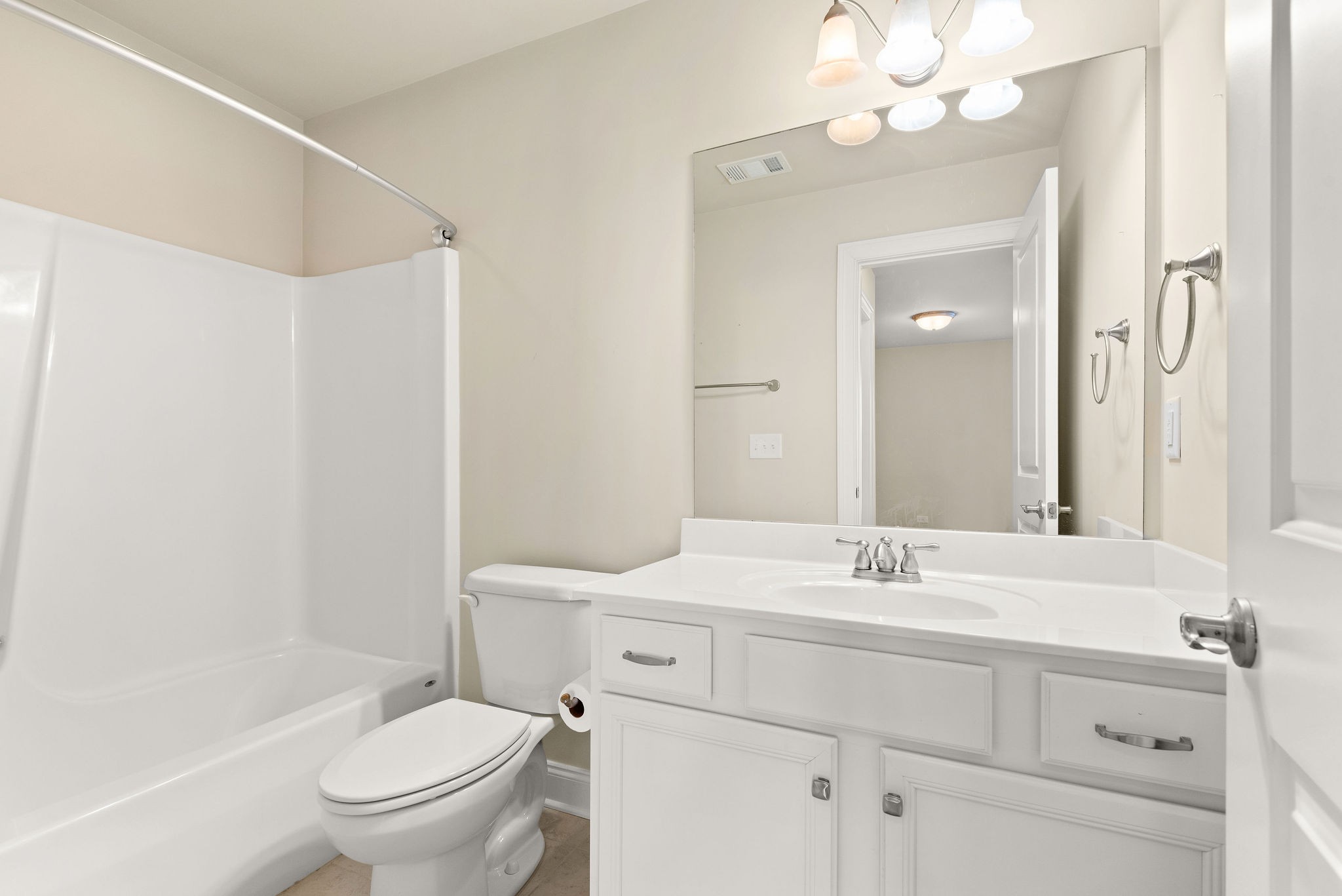 1031 Howland Street Franklin, TN 37064 - Photo 34 of 69 a bathroom with a sink a toilet and a mirror