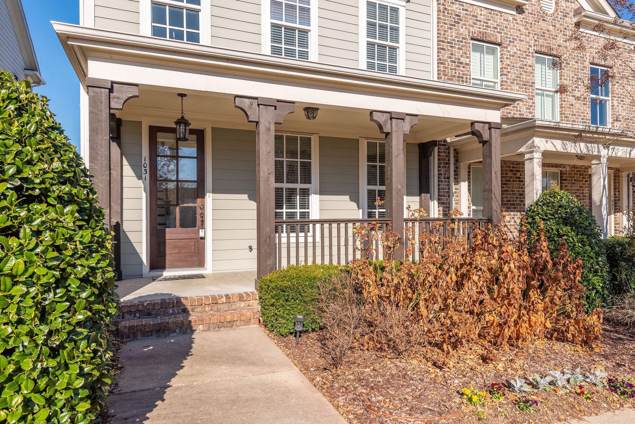 1031 Howland Street Franklin, TN 37064 - Photo 4 of 69 front view of a brick house