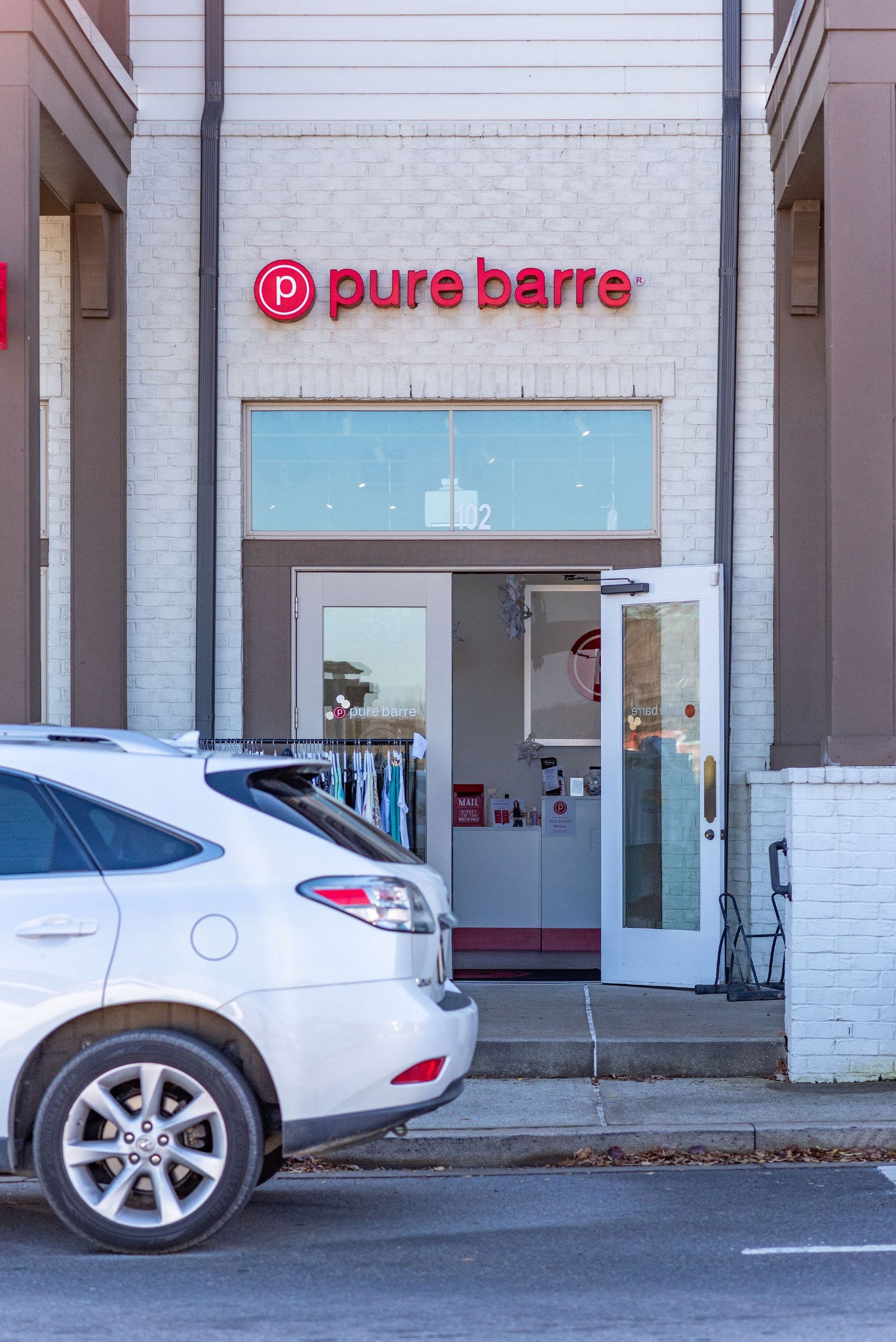 1031 Howland Street Franklin, TN 37064 - Photo 59 of 69 a car parked in front of a building