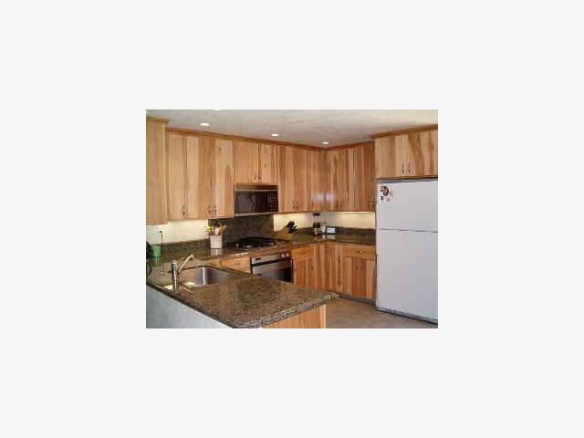 628 Palm Avenue Ripon, CA 95366 - Photo 3 of 10 a kitchen with stainless steel appliances a refrigerator and a stove top oven