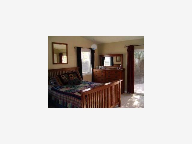 628 Palm Avenue Ripon, CA 95366 - Photo 5 of 10 a living room with furniture and a window