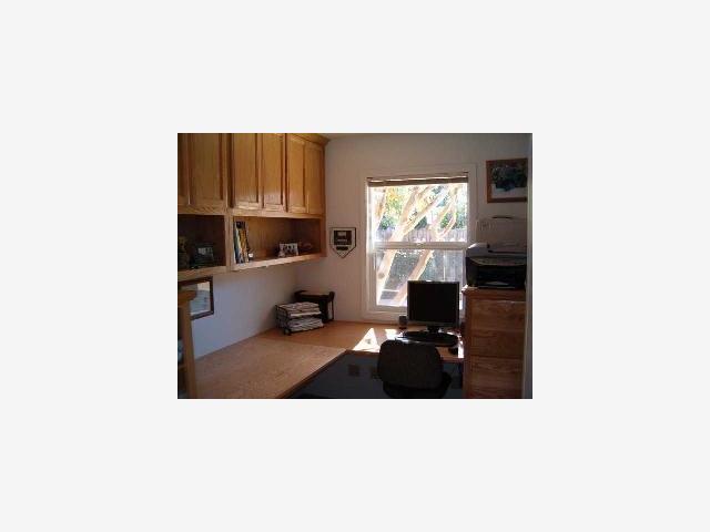628 Palm Avenue Ripon, CA 95366 - Photo 7 of 10 a living room with furniture and a flat screen tv