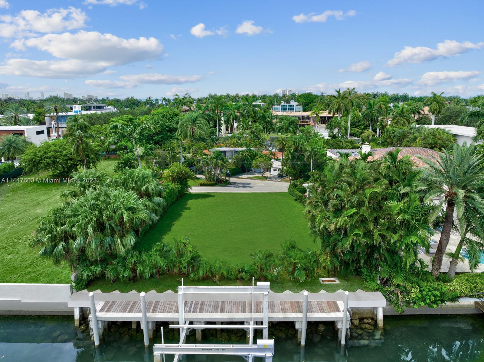 6525 Allison Road Miami Beach, FL 33141 - Photo 15 of 17 a view of a garden with houses