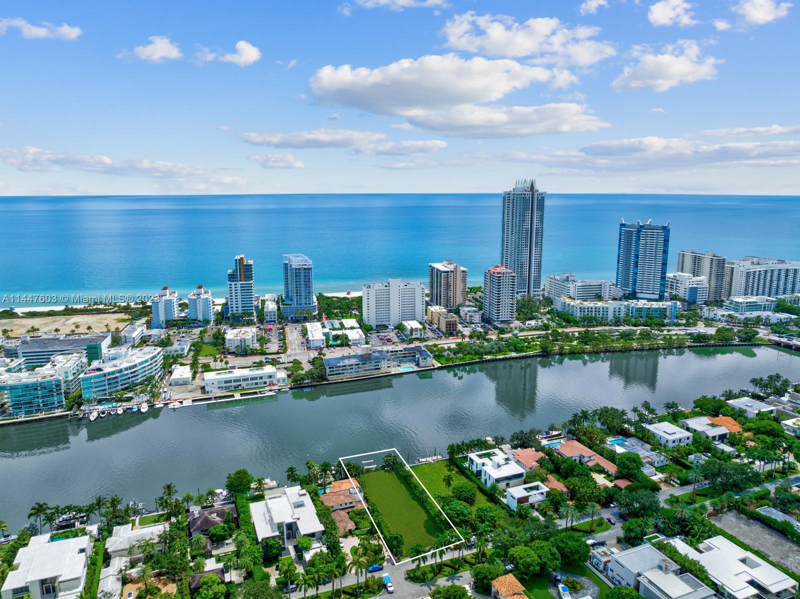 6525 Allison Road Miami Beach, FL 33141 - Photo 4 of 17 a view of a lake with sitting area