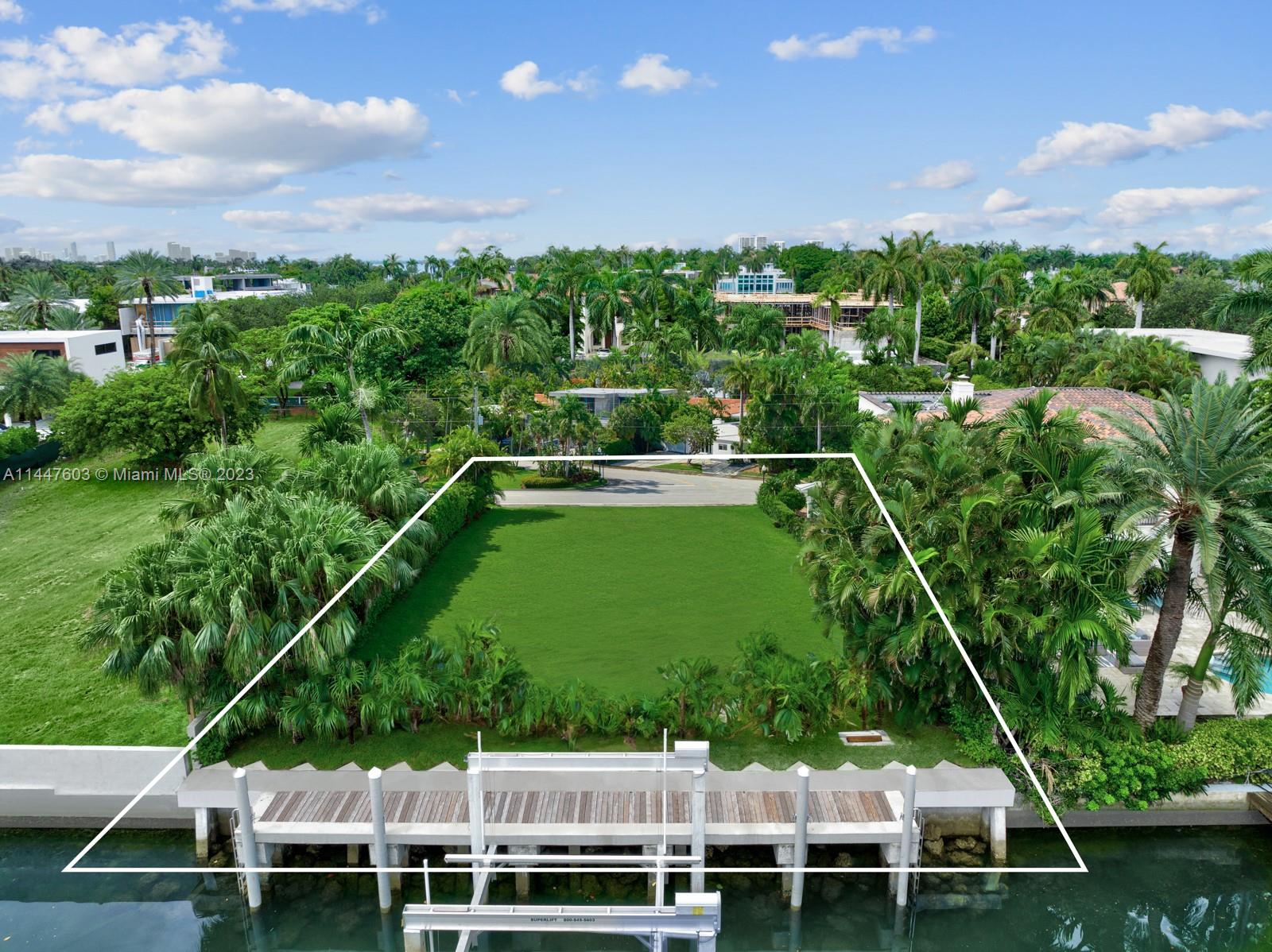 6525 Allison Road Miami Beach, FL 33141 - Photo 5 of 17 a view of a backyard with sitting area