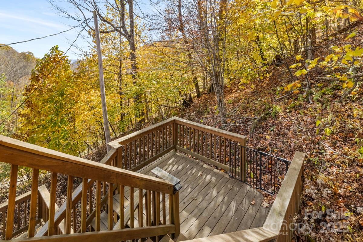 563 Bee Tree Lane Mars Hill, NC 28754 - Photo 15 of 28 a view of balcony with wooden floor