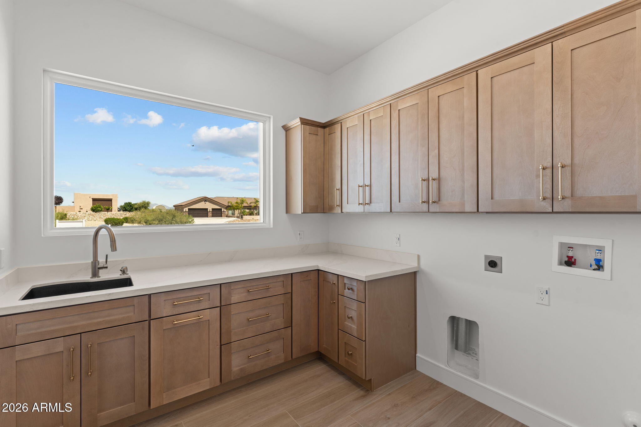 2855 Percheron Road Wickenburg, AZ 85390 - Photo 45 of 58 a kitchen with a sink cabinets and window