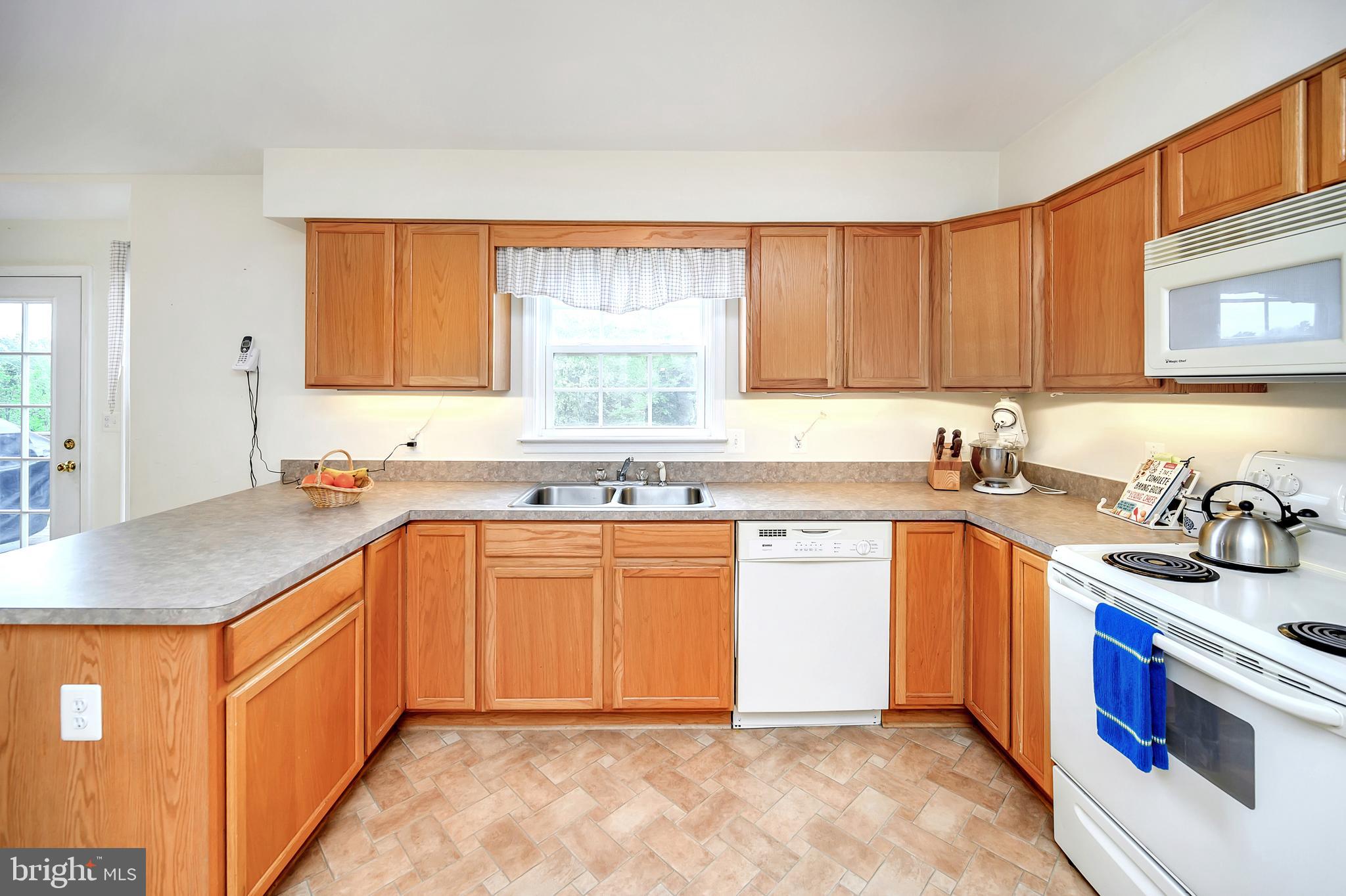 12063 Obannons Mill Road Boston, VA 22713 - Photo 11 of 38 A cheerful kitchen for gatherings
