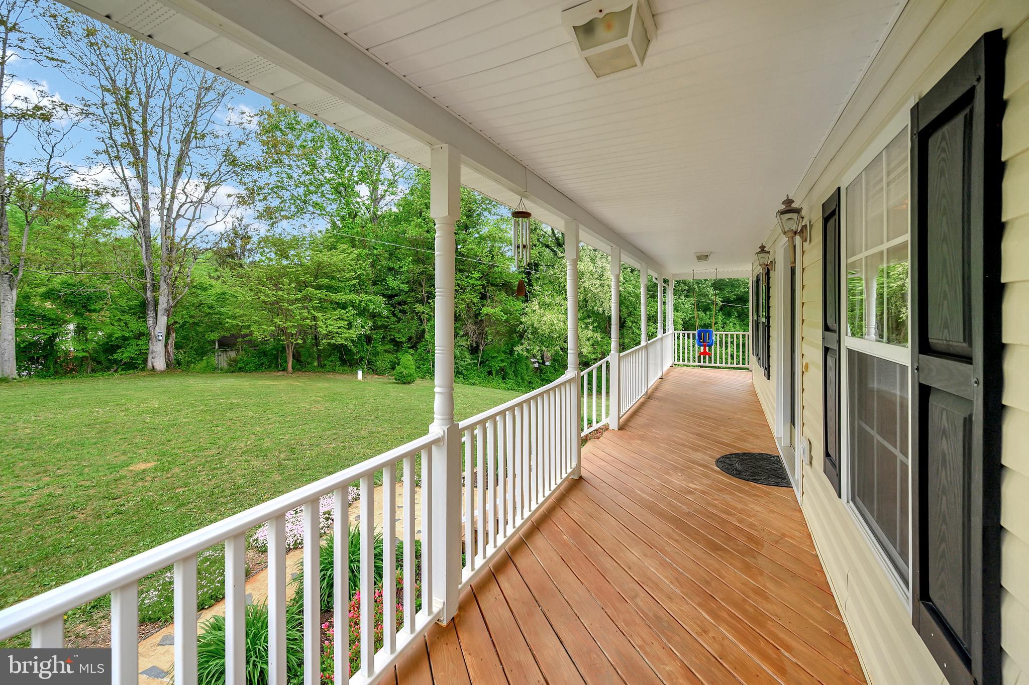 12063 Obannons Mill Road Boston, VA 22713 - Photo 9 of 38 Nothing better than front porch sitting!
