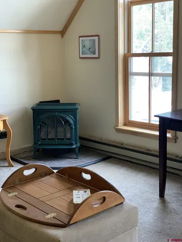 a room with furniture and a wooden floor