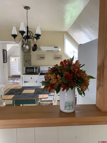 a vase of flowers sitting on a table