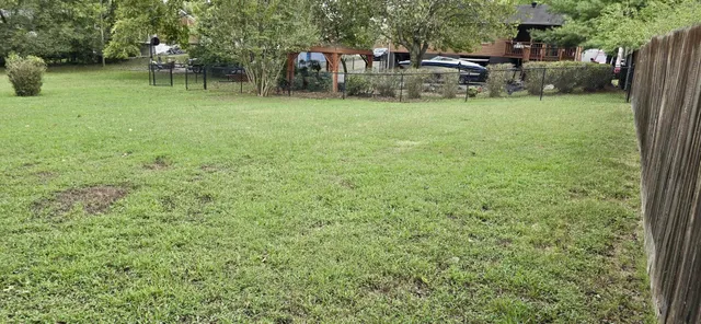 a backyard of a house with seating space
