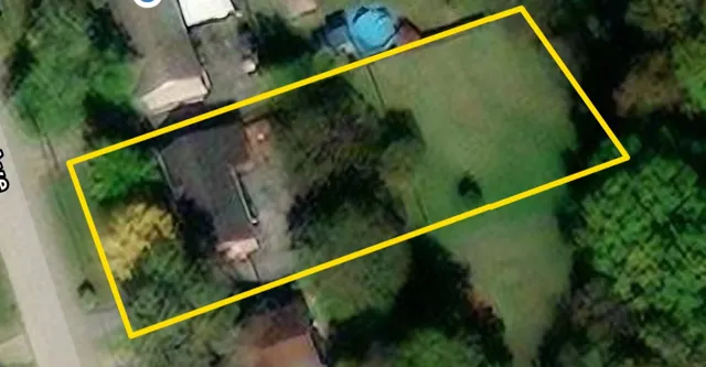 a view of swimming pool from a balcony