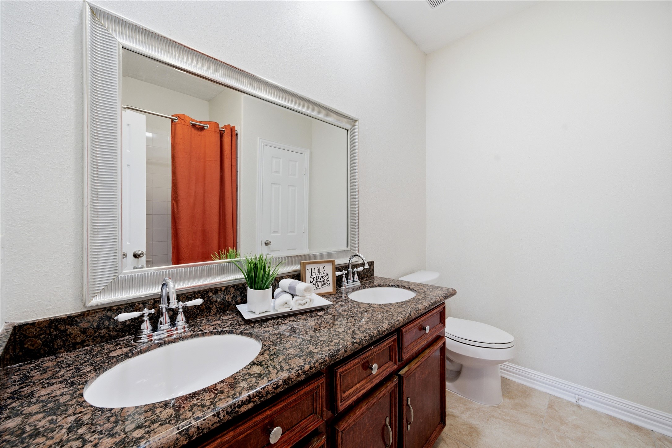 3001 Wayne Street Houston, TX 77026 - Photo 16 of 31 Primary bath features double sink and a linen closet