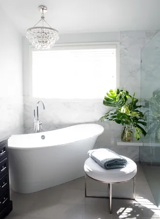 a white bath tub sitting in a bathroom