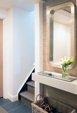 a potted plant sitting on top of a shelf