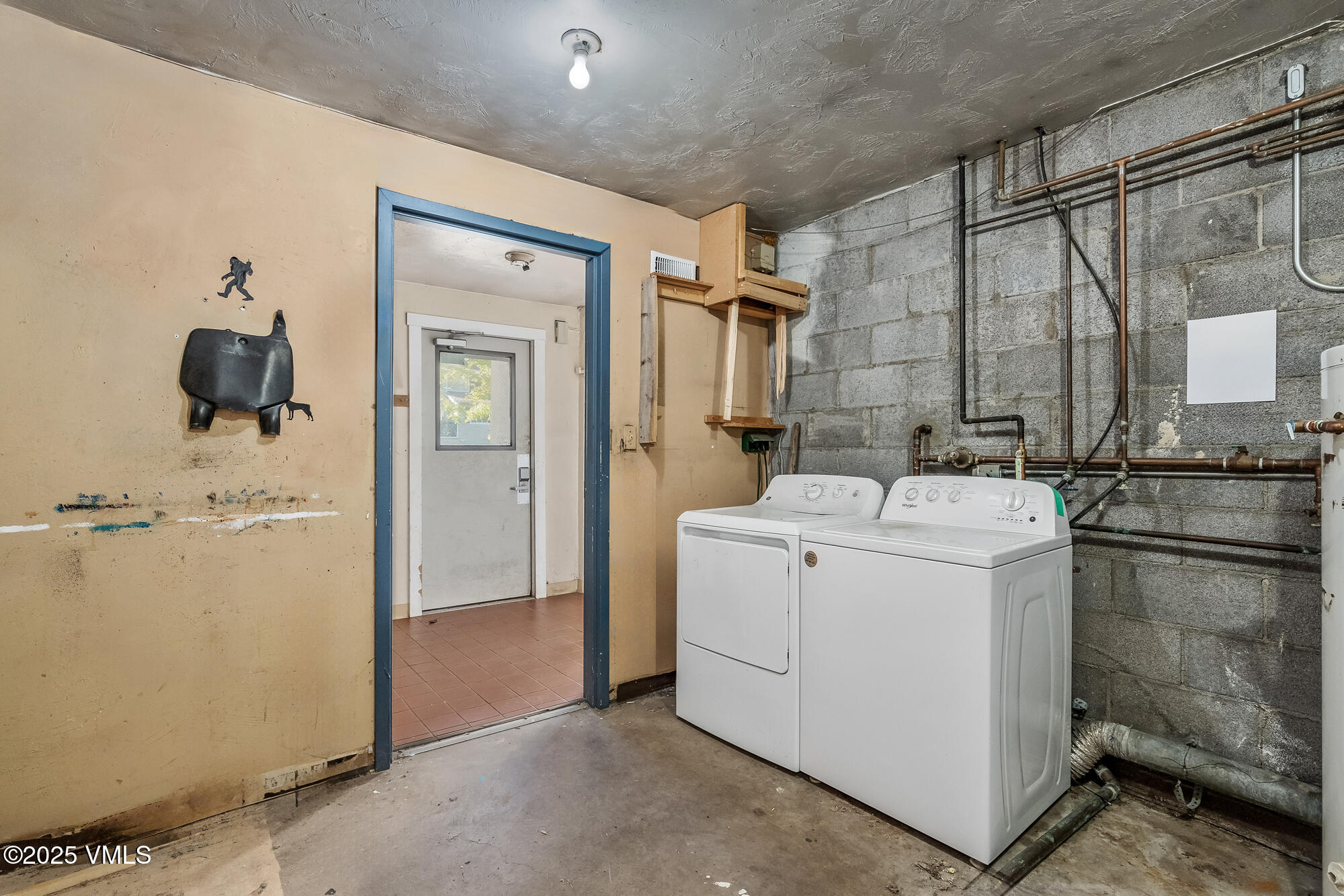 249 Eagle Road Eagle-Vail, CO 81620 - Photo 13 of 22 a utility room with dryer and washer