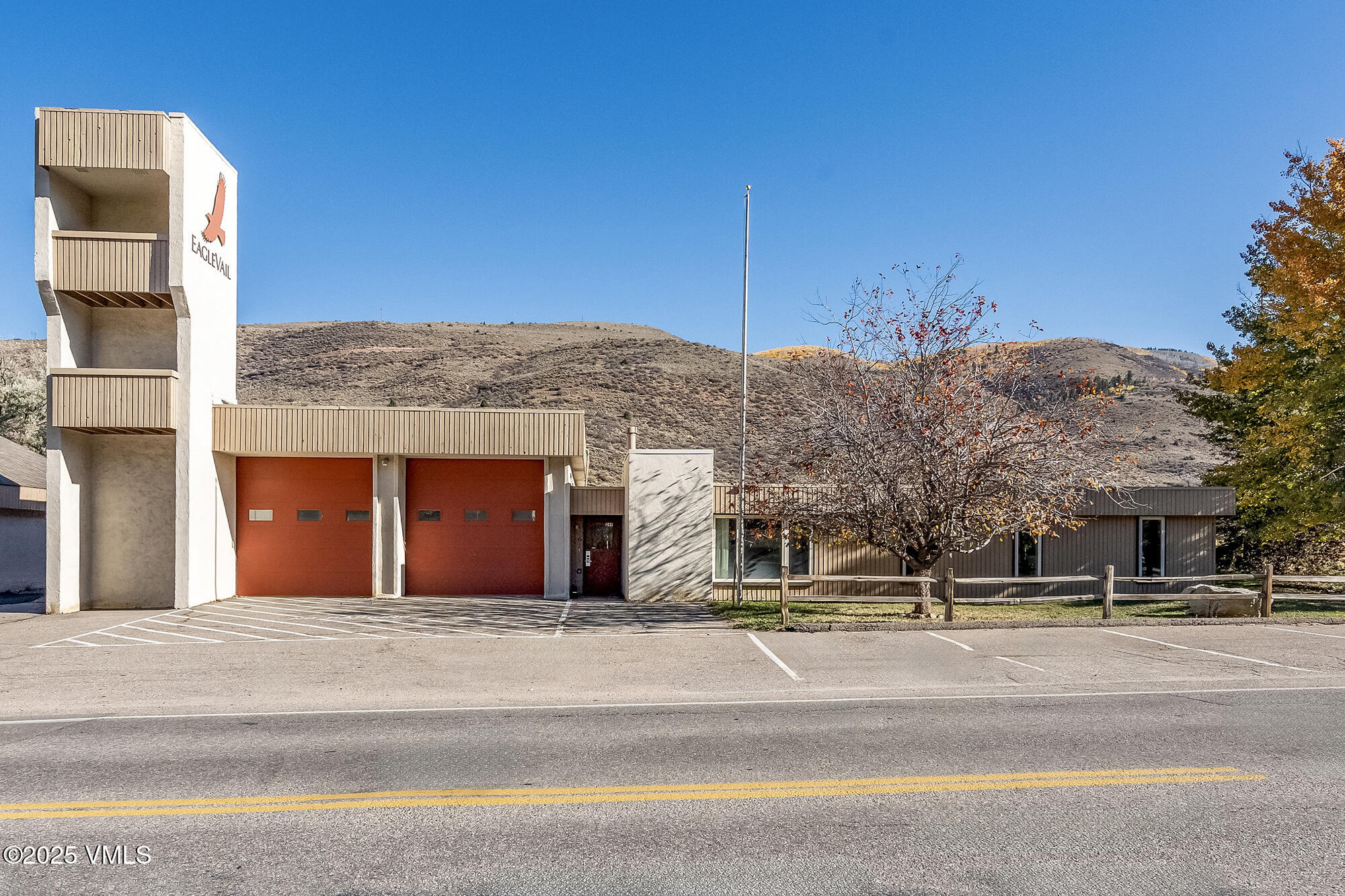 249 Eagle Road Eagle-Vail, CO 81620 - Photo 21 of 22 a view of a brick building next to a yard