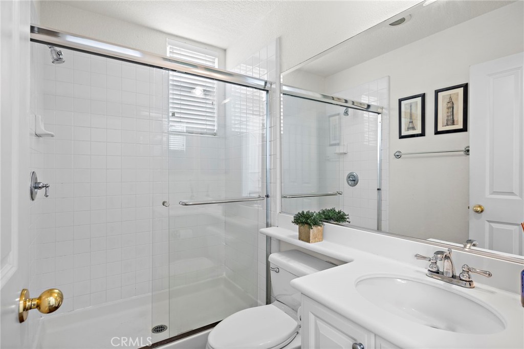 16 Skywood Street Ladera Ranch, CA 92694 - Photo 17 of 36 a bathroom with a sink toilet and shower