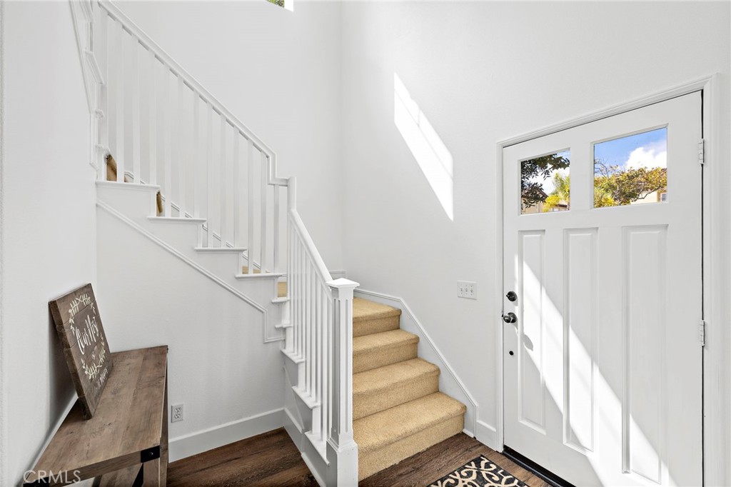16 Skywood Street Ladera Ranch, CA 92694 - Photo 21 of 36 a view of entryway with wooden floor and stairs
