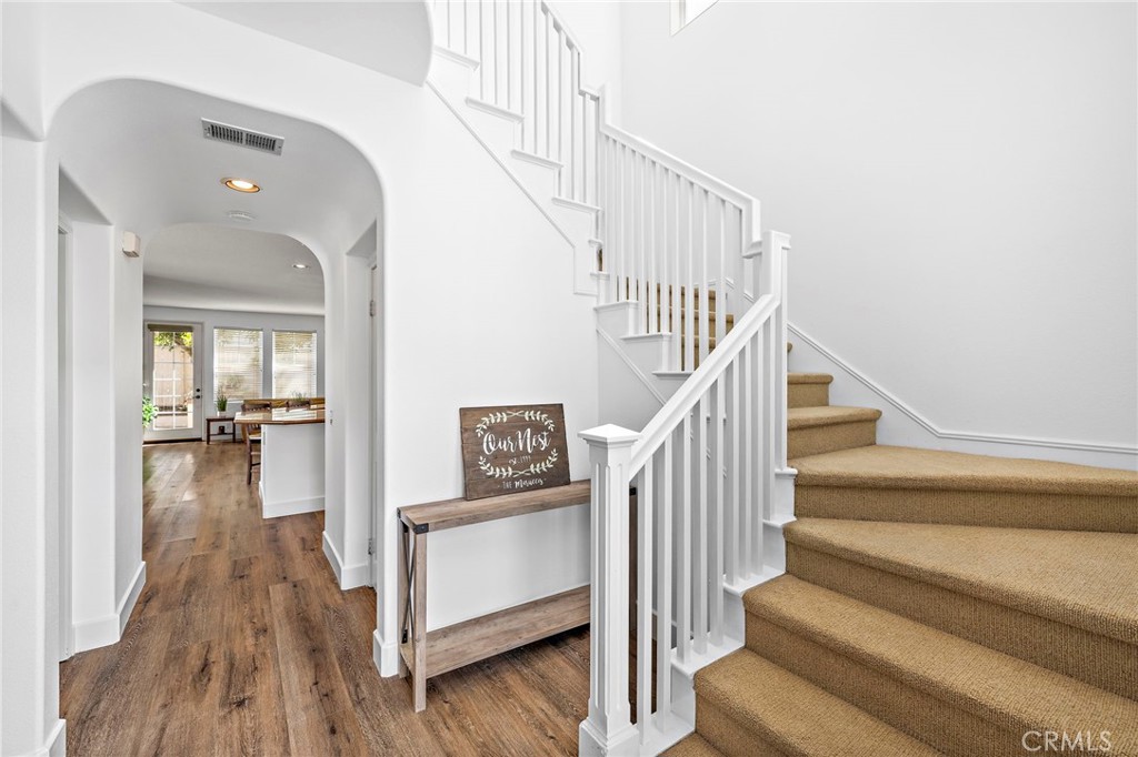 16 Skywood Street Ladera Ranch, CA 92694 - Photo 3 of 36 a view of entryway and hall with wooden floor