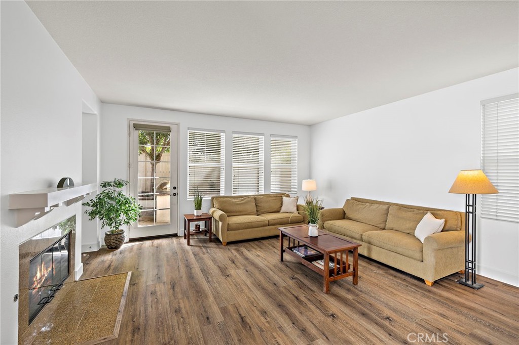 16 Skywood Street Ladera Ranch, CA 92694 - Photo 10 of 36 a living room with furniture and a large window