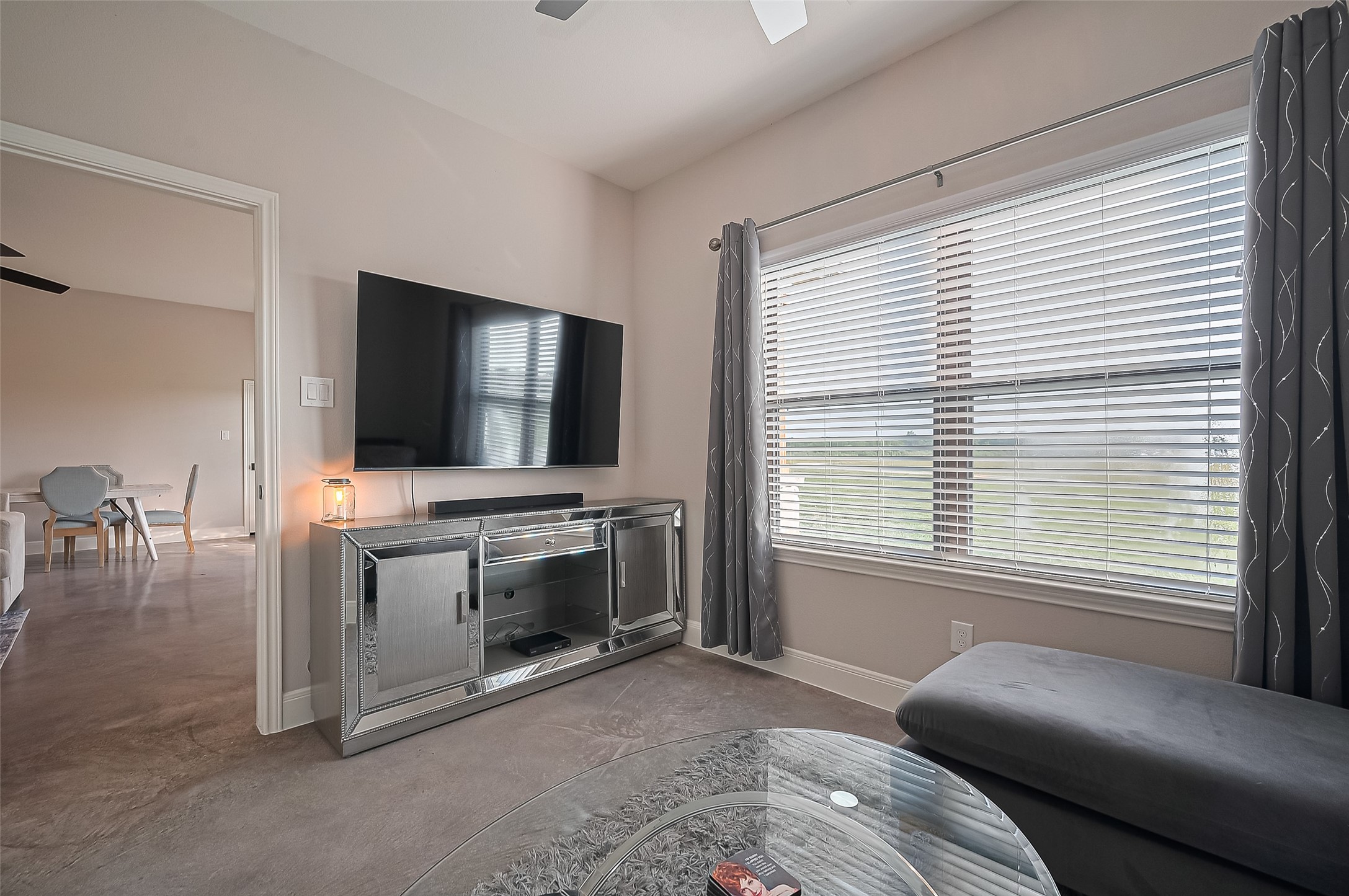 16702 Dipple Road Guy, TX 77444 - Photo 17 of 50 a living room with furniture and a flat screen tv