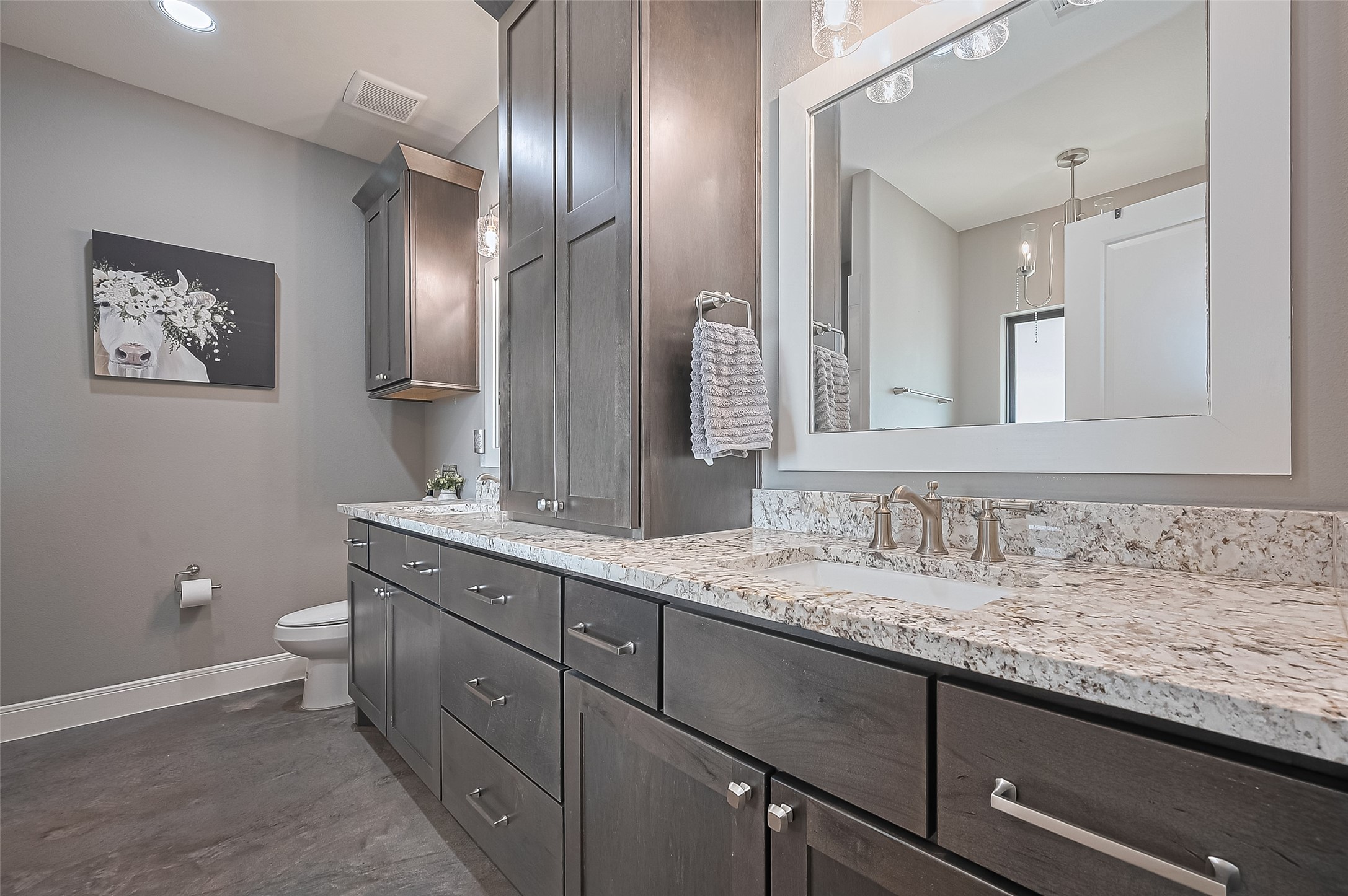 16702 Dipple Road Guy, TX 77444 - Photo 27 of 50 a bathroom with a granite countertop sink a large mirror and a toilet
