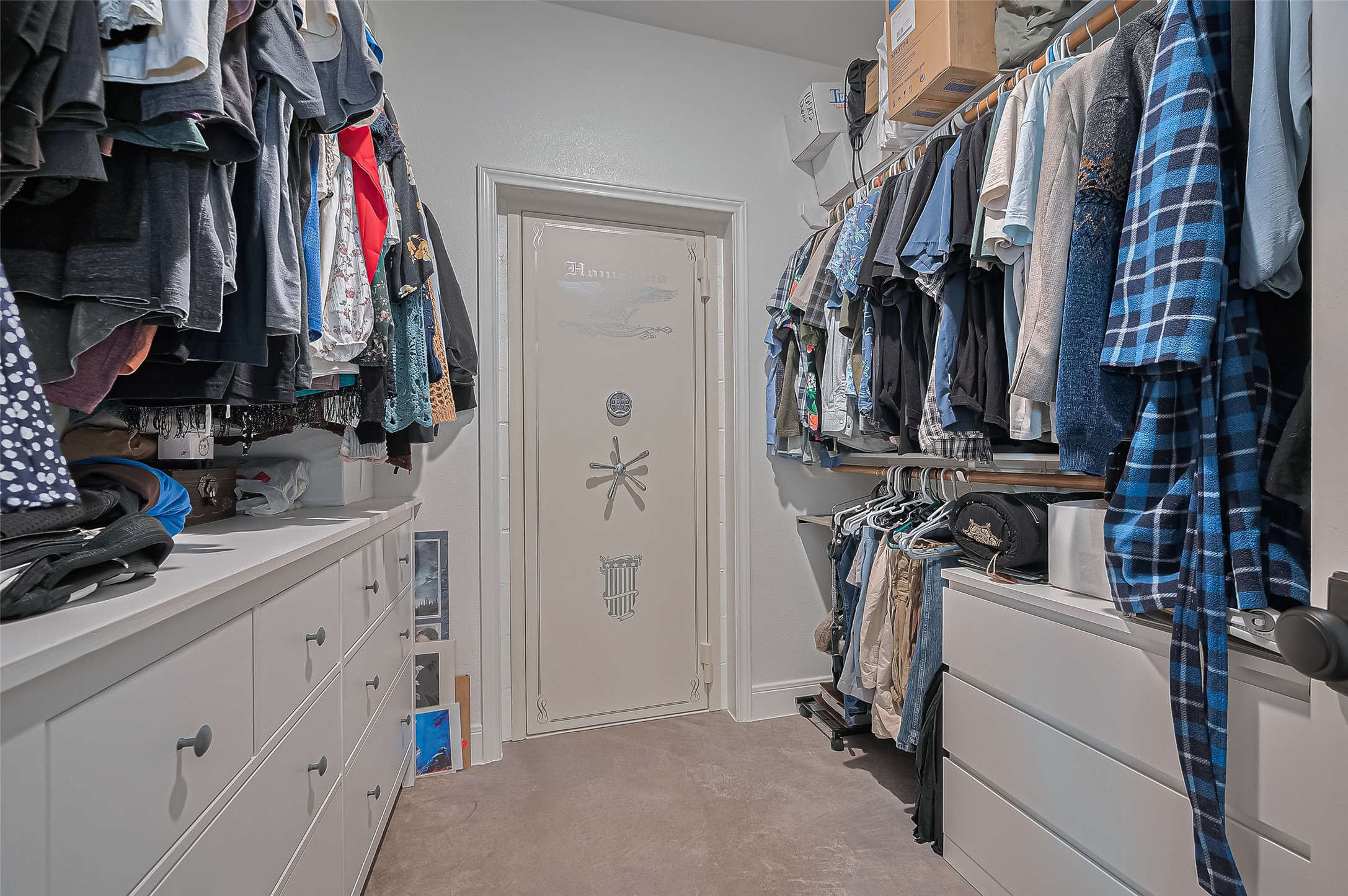 16702 Dipple Road Guy, TX 77444 - Photo 31 of 50 a view of walk in closet with clothes and shoes
