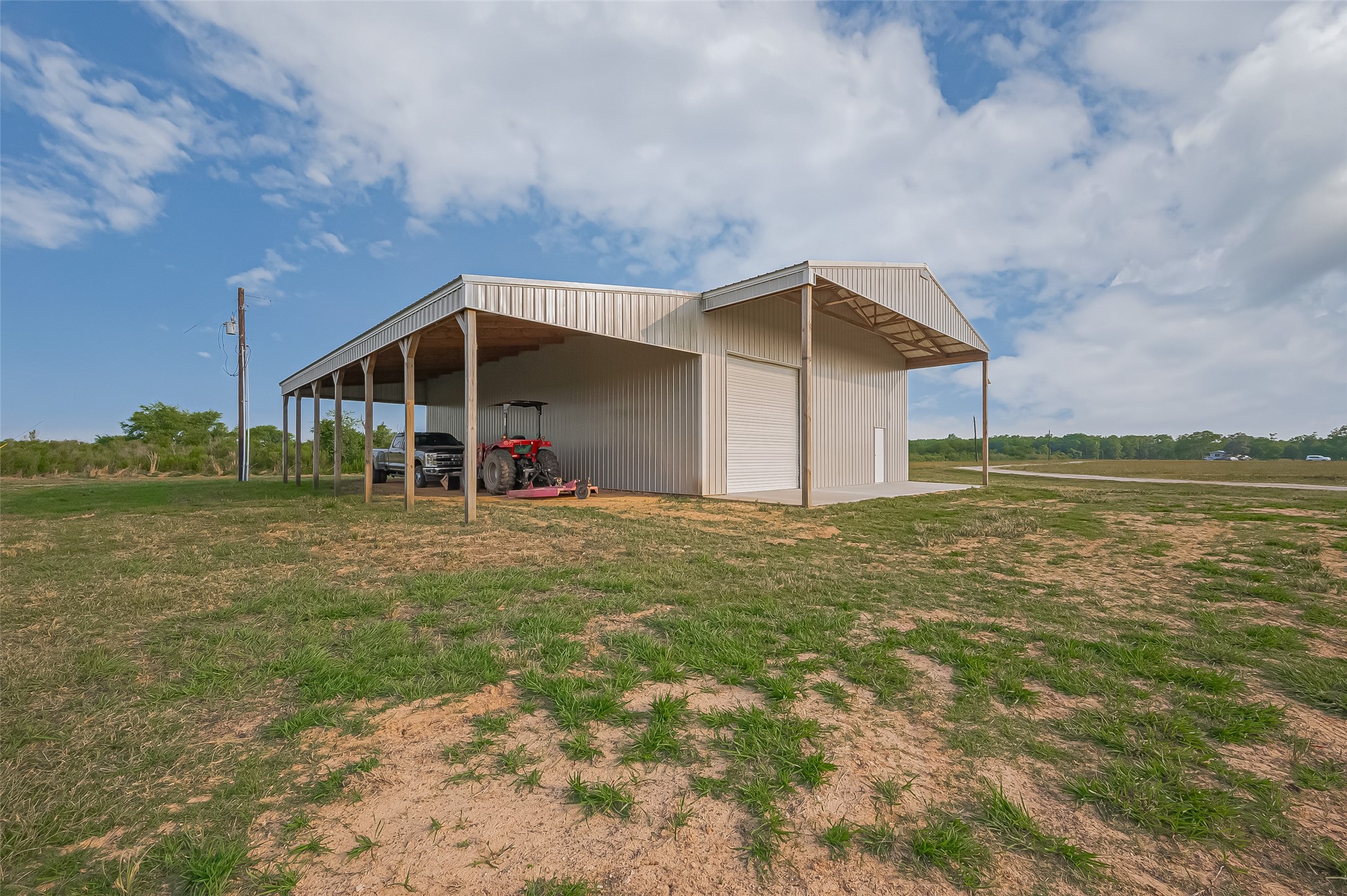 16702 Dipple Road Guy, TX 77444 - Photo 39 of 50 a view of a house with a yard